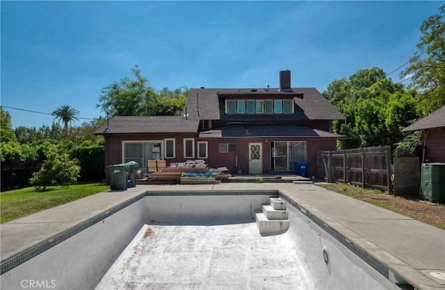 208 Highland Pl, Monrovia, CA 91016 - back of house with a patio and a chimney