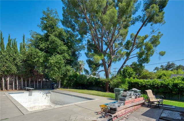 208 Highland Pl, Monrovia, CA 91016 - view of swimming pool with a patio, a fenced backyard, and a diving board