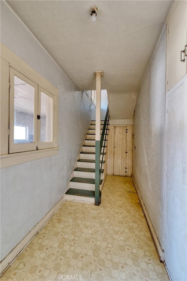 208 Highland Pl, Monrovia, CA 91016 - below grade area with light flooring and stairs