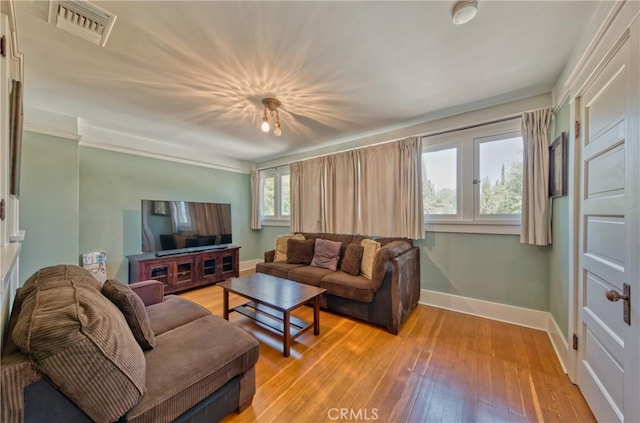 208 Highland Pl, Monrovia, CA 91016 - living room featuring baseboards and light wood-style flooring