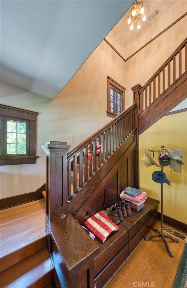 208 Highland Pl, Monrovia, CA 91016 - stairs with baseboards and wood finished floors