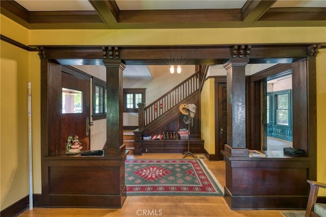 208 Highland Pl, Monrovia, CA 91016 - entrance foyer with decorative columns, beamed ceiling, wood finished floors, stairs, and coffered ceiling
