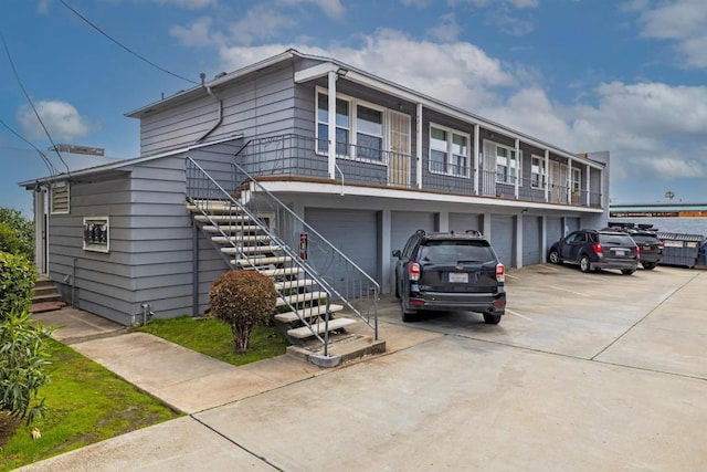 481848321/2 Palm Ave, La Mesa, CA 91942 - view of property featuring driveway, stairs, and an attached garage