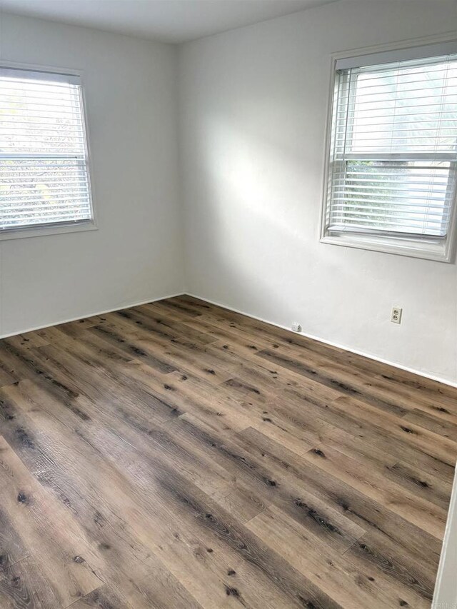 481848321/2 Palm Ave, La Mesa, CA 91942 - unfurnished room with dark wood-style floors