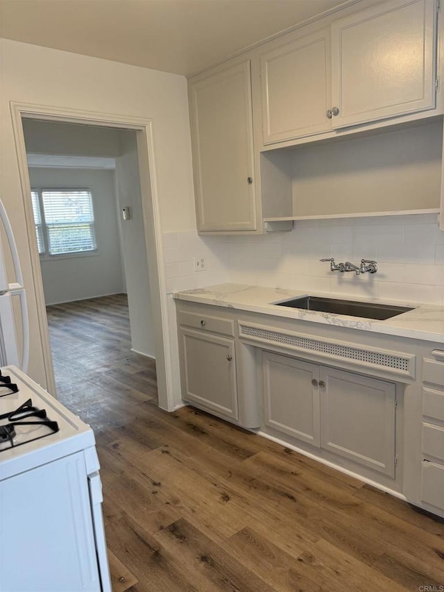 481848321/2 Palm Ave, La Mesa, CA 91942 - kitchen with a sink, open shelves, gas range gas stove, backsplash, and dark wood-style flooring
