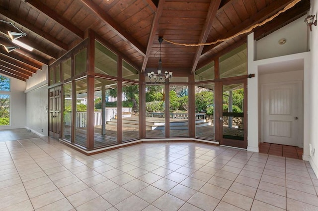1628 Lone Oak Rd, Vista, CA 92084 - tiled empty room featuring wooden ceiling with exposed beams, a chandelier, high vaulted ceiling, and baseboards