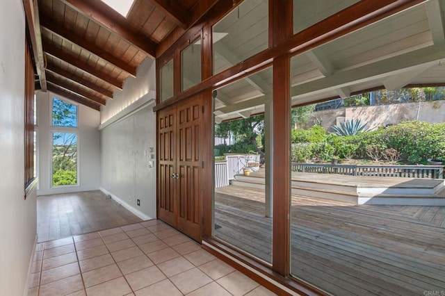 1628 Lone Oak Rd, Vista, CA 92084 - entryway with light tile patterned floors, wooden ceiling, and baseboards