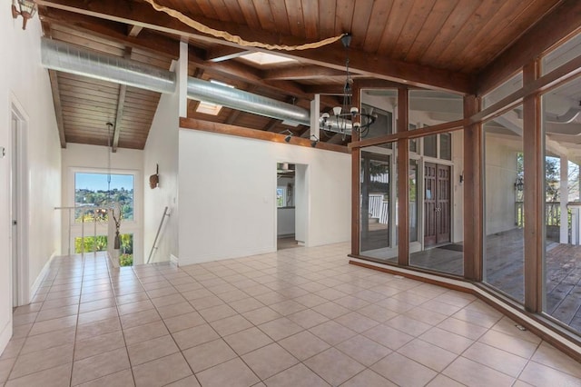 1628 Lone Oak Rd, Vista, CA 92084 - spare room with a chandelier, wood ceiling, tile patterned flooring, and baseboards