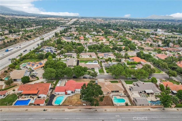 1926 N Vallejo Way, Upland, CA 91784 - aerial perspective of suburban area with a pool area