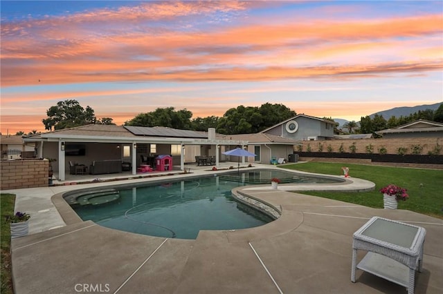 1926 N Vallejo Way, Upland, CA 91784 - pool at dusk featuring a patio area and an outdoor pool