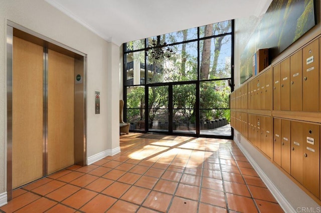 3213 Raintree Cir, Culver City, CA 90230 - community lobby with ornamental molding and a wall of windows