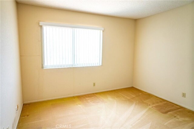 2868 Corte Caballos, Camarillo, CA 93010 - carpeted empty room featuring plenty of natural light and baseboards