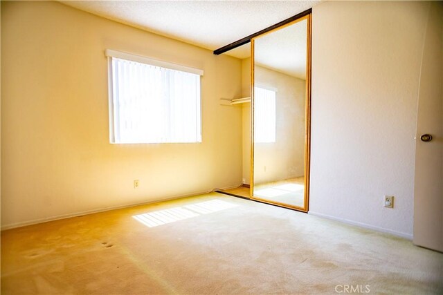2868 Corte Caballos, Camarillo, CA 93010 - unfurnished bedroom with carpet floors, a closet, and baseboards