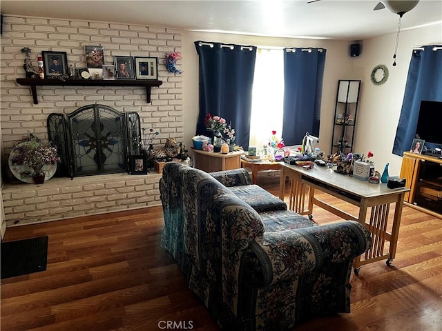 7887 Kempster Ave, Fontana, CA 92336 - living room with wood finished floors and brick wall