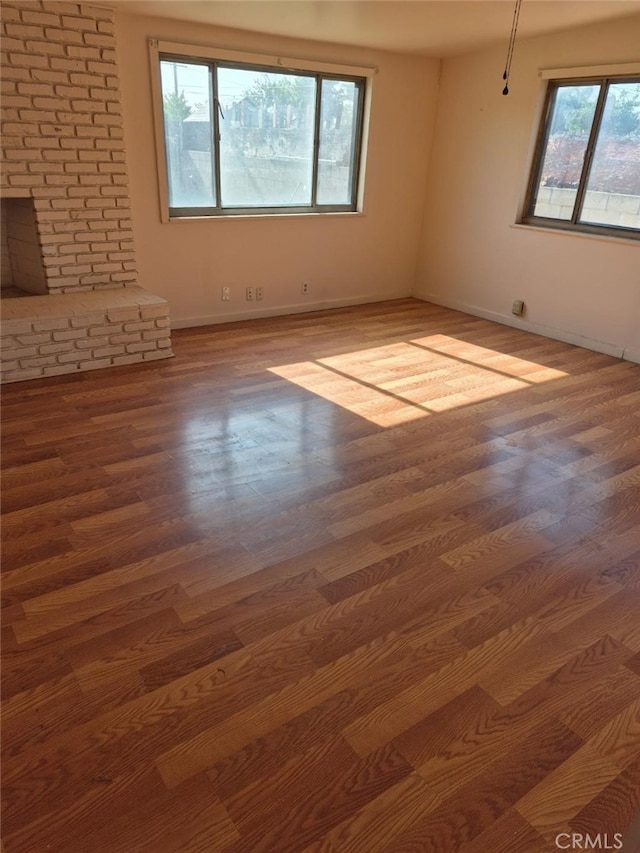 7887 Kempster Ave, Fontana, CA 92336 - unfurnished room featuring baseboards and wood finished floors