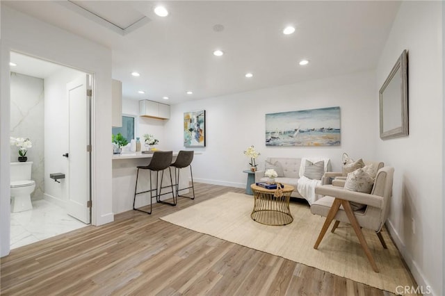 11012 Montgomery Ave, Granada Hills, CA 91344 - living room featuring baseboards, recessed lighting, and light wood-style floors