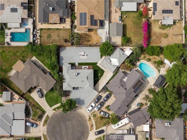 11012 Montgomery Ave, Granada Hills, CA 91344 - aerial perspective of suburban area featuring a pool