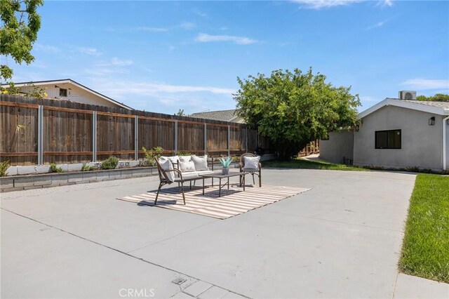 11012 Montgomery Ave, Granada Hills, CA 91344 - fenced backyard featuring outdoor lounge area and a patio area