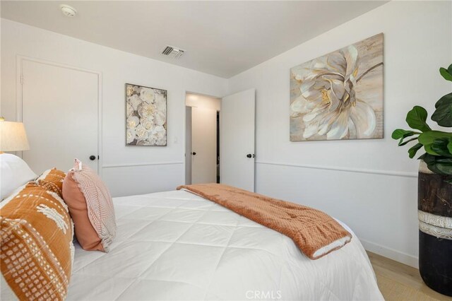 11012 Montgomery Ave, Granada Hills, CA 91344 - bedroom featuring wood finished floors and baseboards