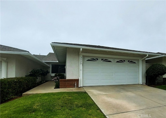 3520 Paseo Flamenco, San Clemente, CA 92672 - view of front of home with stucco siding, an attached garage, and concrete driveway