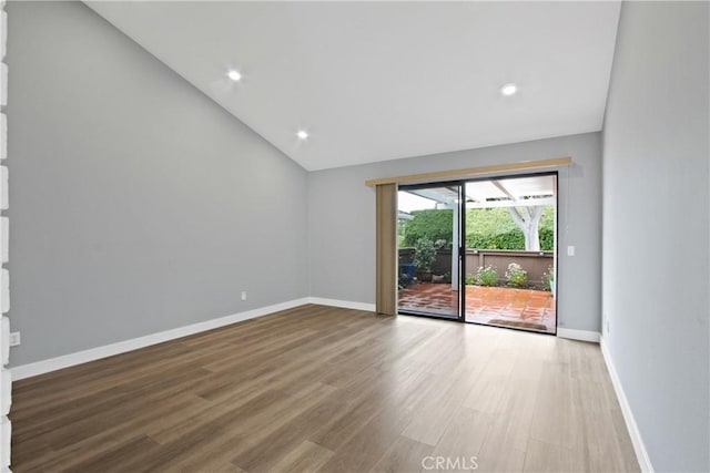 3520 Paseo Flamenco, San Clemente, CA 92672 - empty room with lofted ceiling, baseboards, wood finished floors, and recessed lighting