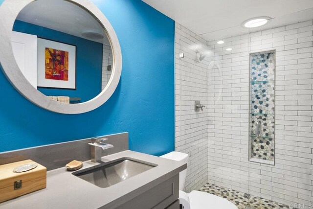 2211 Bancroft St, San Diego, CA 92104 - bathroom featuring a shower stall, vanity, and toilet