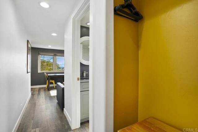 2211 Bancroft St, San Diego, CA 92104 - corridor featuring wood finished floors, baseboards, and recessed lighting