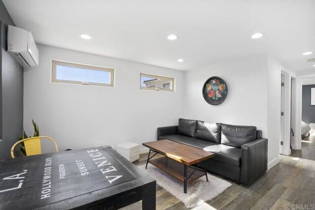 2211 Bancroft St, San Diego, CA 92104 - living room featuring a wall mounted AC, wood finished floors, recessed lighting, and baseboards