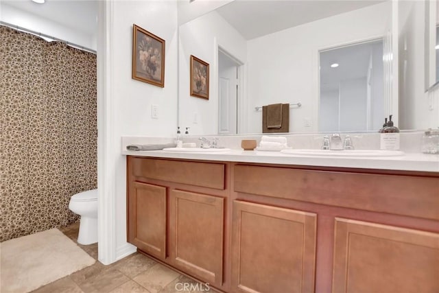 18026 Crabapple Ct, San Bernardino, CA 92407 - bathroom with double vanity, a shower with curtain, and tile patterned flooring