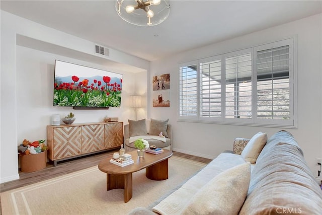 18026 Crabapple Ct, San Bernardino, CA 92407 - living room featuring wood finished floors and baseboards
