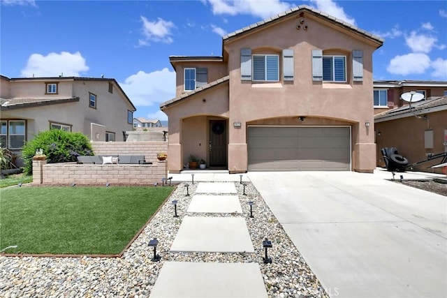 18026 Crabapple Ct, San Bernardino, CA 92407 - mediterranean / spanish-style house featuring stucco siding, concrete driveway, and an attached garage