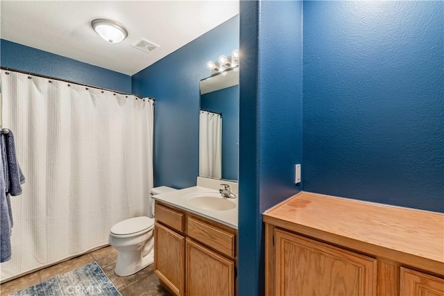 38260 Willow Ct, Murrieta, CA 92562 - bathroom featuring vanity, toilet, a textured wall, a shower with shower curtain, and tile patterned floors