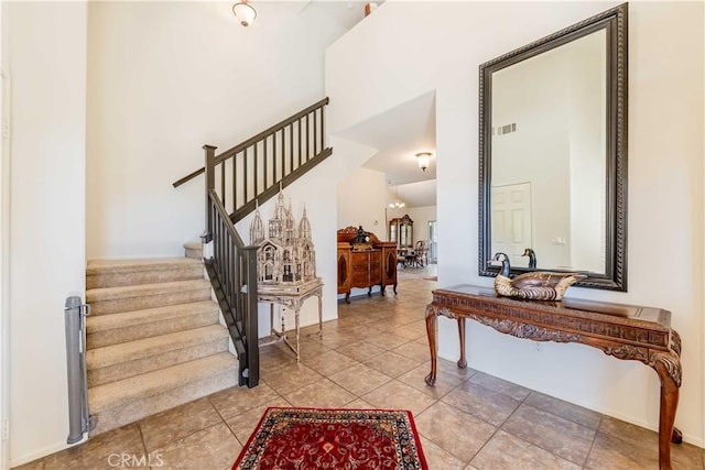 38260 Willow Ct, Murrieta, CA 92562 - foyer with stairs, a high ceiling, and tile patterned flooring