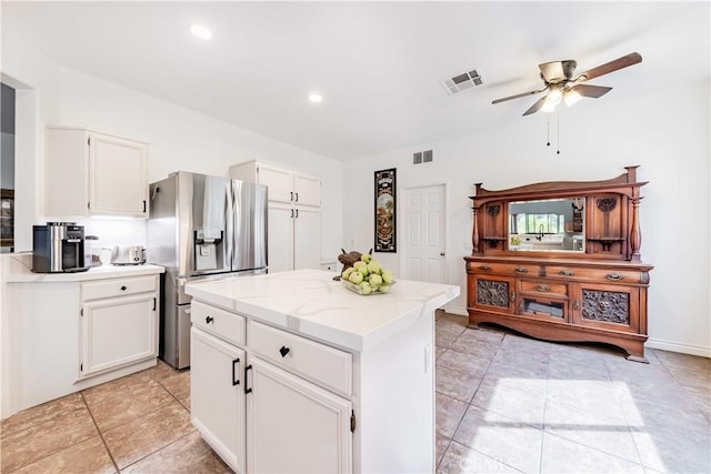 38260 Willow Ct, Murrieta, CA 92562 - kitchen with stainless steel refrigerator with ice dispenser, ceiling fan, white cabinets, a center island, and recessed lighting