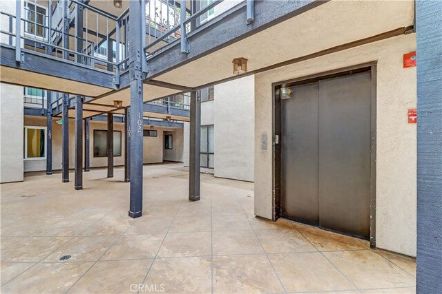 2032 E Bermuda St Unit 103, Long Beach, CA 90814 - view of patio featuring elevator