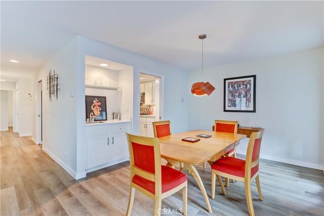 2032 E Bermuda St Unit 103, Long Beach, CA 90814 - dining area with light wood-style flooring, baseboards, and recessed lighting
