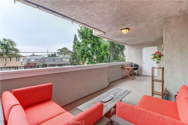 2032 E Bermuda St Unit 103, Long Beach, CA 90814 - view of patio / terrace with a balcony