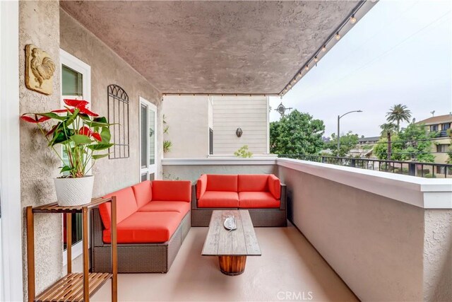 2032 E Bermuda St Unit 103, Long Beach, CA 90814 - balcony featuring an outdoor living space