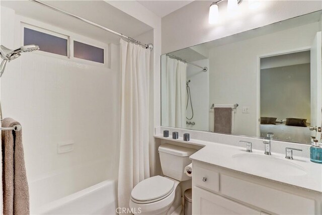 2032 E Bermuda St Unit 103, Long Beach, CA 90814 - ensuite bathroom featuring shower / bathtub combination with curtain, vanity, and toilet