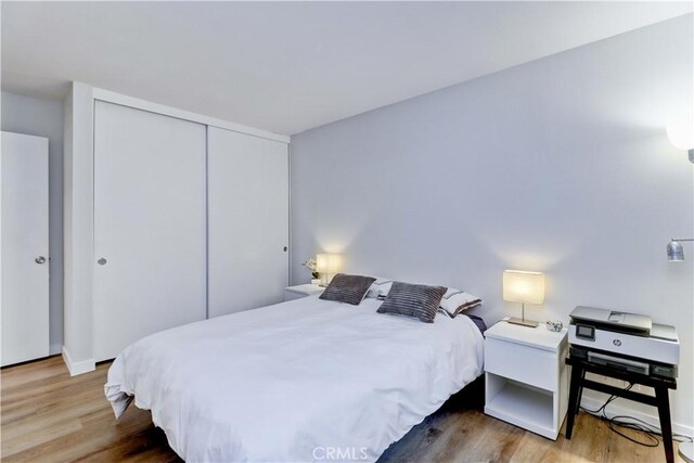 2032 E Bermuda St Unit 103, Long Beach, CA 90814 - bedroom featuring wood finished floors and a closet
