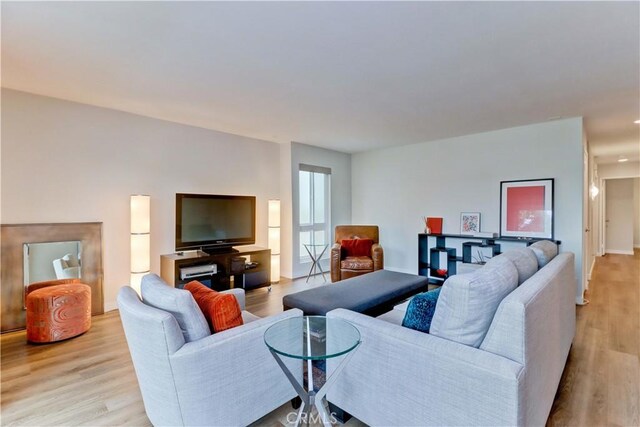 2032 E Bermuda St Unit 103, Long Beach, CA 90814 - living area with light wood-style floors