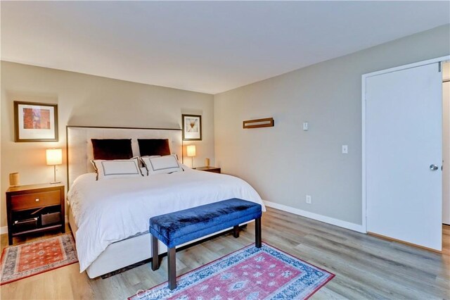 2032 E Bermuda St Unit 103, Long Beach, CA 90814 - bedroom featuring wood finished floors and baseboards