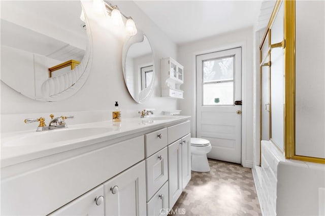 1315 E Wingate St, Covina, CA 91724 - full bath featuring double vanity, toilet, and tile patterned floors