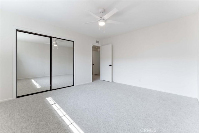 1315 E Wingate St, Covina, CA 91724 - unfurnished bedroom with carpet flooring, a closet, a ceiling fan, and baseboards