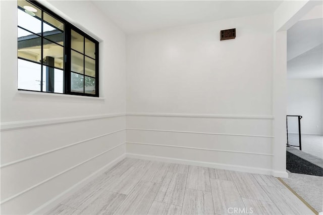 1315 E Wingate St, Covina, CA 91724 - empty room with wood finished floors and healthy amount of natural light