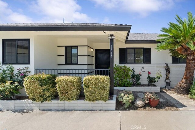 1315 E Wingate St, Covina, CA 91724 - bungalow with stucco siding and a porch