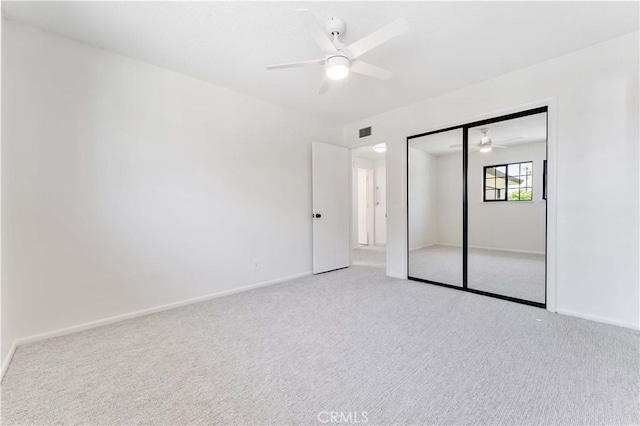 1315 E Wingate St, Covina, CA 91724 - unfurnished bedroom with carpet flooring, a closet, and a ceiling fan