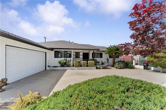 1315 E Wingate St, Covina, CA 91724 - ranch-style house featuring stucco siding, an attached garage, driveway, and a gate