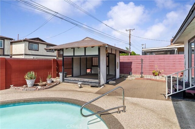1315 E Wingate St, Covina, CA 91724 - view of pool featuring a fenced backyard, a patio, and an outdoor structure