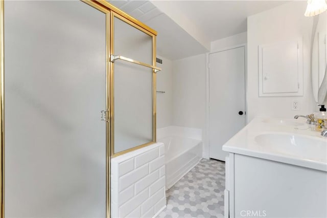 1315 E Wingate St, Covina, CA 91724 - full bath with a stall shower, a garden tub, vanity, and tile patterned floors